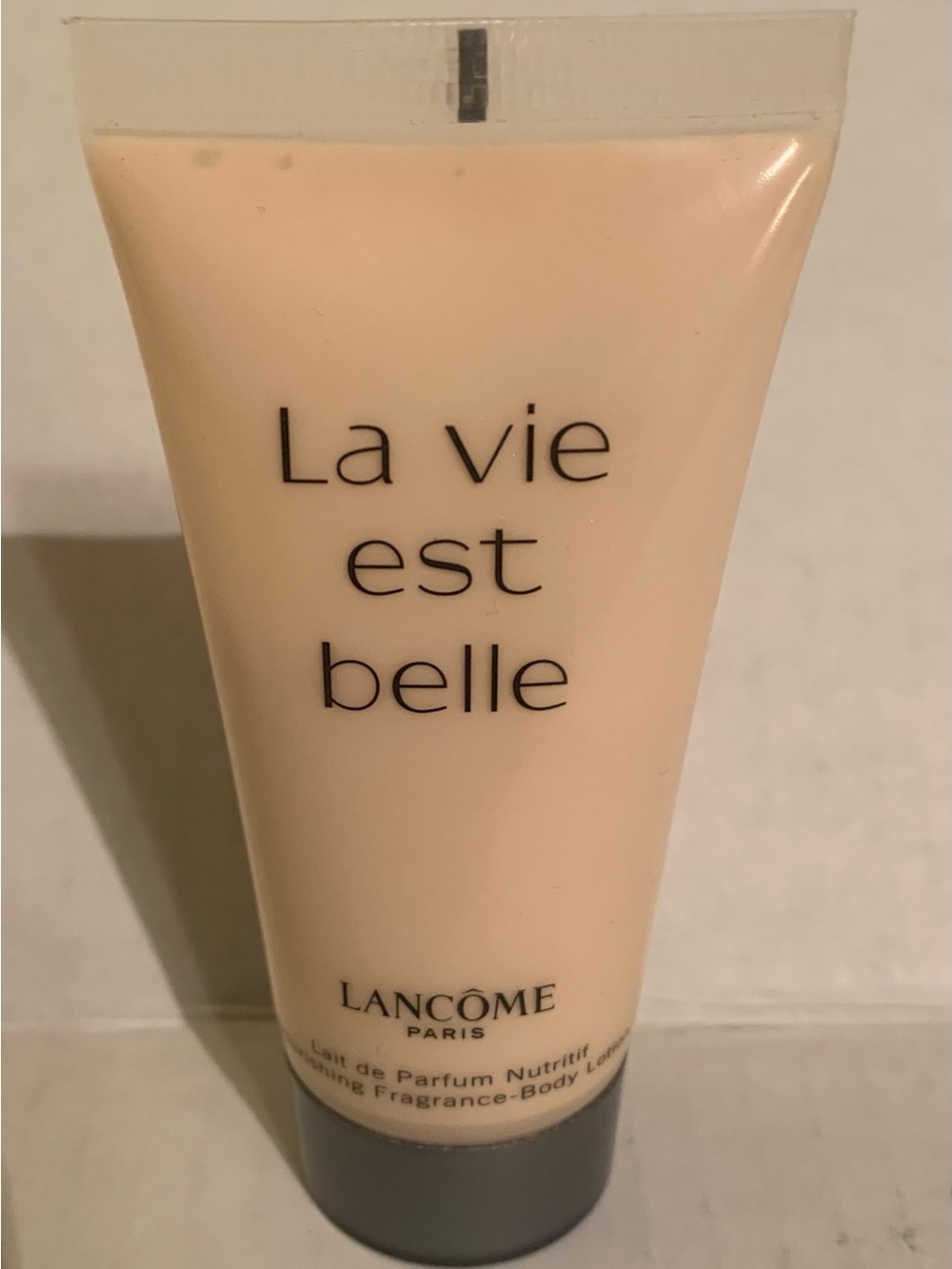 La Vie Est Belle Nourishing Body Lotion — Light Peach Travel Size 1.7 oz